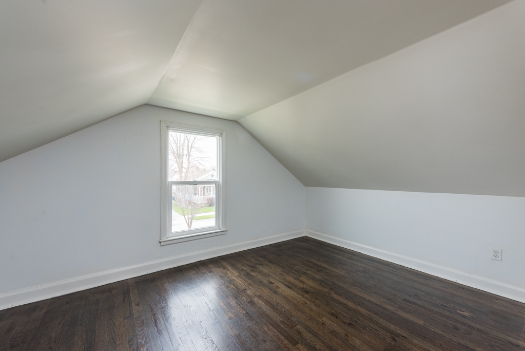 1111 Jones Avenue Racine, WI 53402 - Photo 18 of 27 an empty room with wooden floor and window