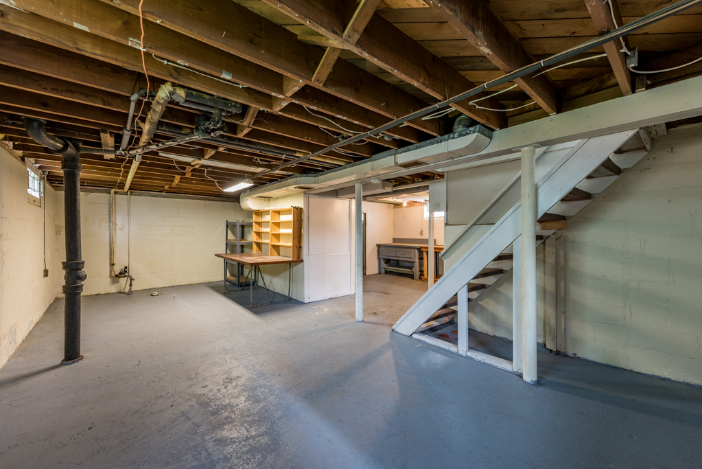 1111 Jones Avenue Racine, WI 53402 - Photo 20 of 27 a view of an empty room with stairs