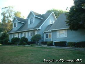 a view of a house with garden