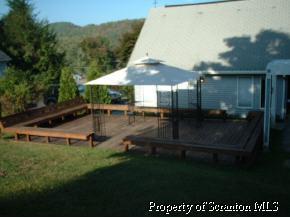 183 Sullivan - Rt Trail, Unit 92516 West Pittston, PA 18643 - Photo 3 of 5 a view of a backyard