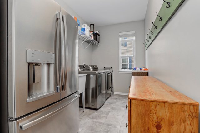5961 Chatham Drive Hoffman Estates, IL 60192 - Photo 33 of 39 a view of walk in closet with clothes and shoes
