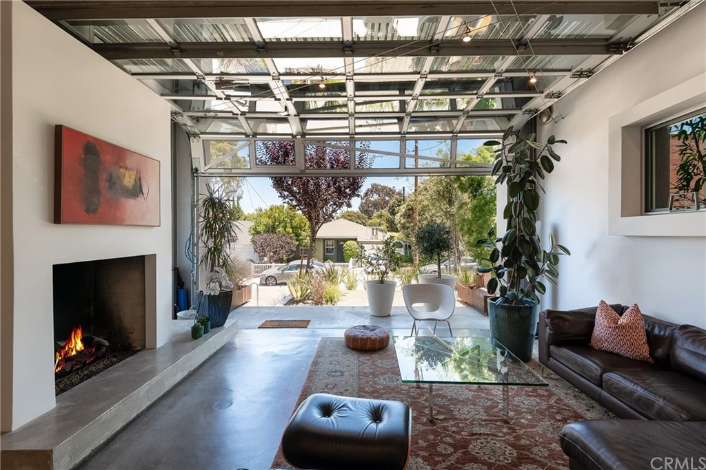 1149 Pine Avenue Manhattan Beach, CA 90266 - Photo 11 of 48 a living room with furniture and a fireplace