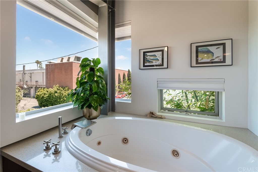 1149 Pine Avenue Manhattan Beach, CA 90266 - Photo 39 of 48 a bathroom with a tub and a window