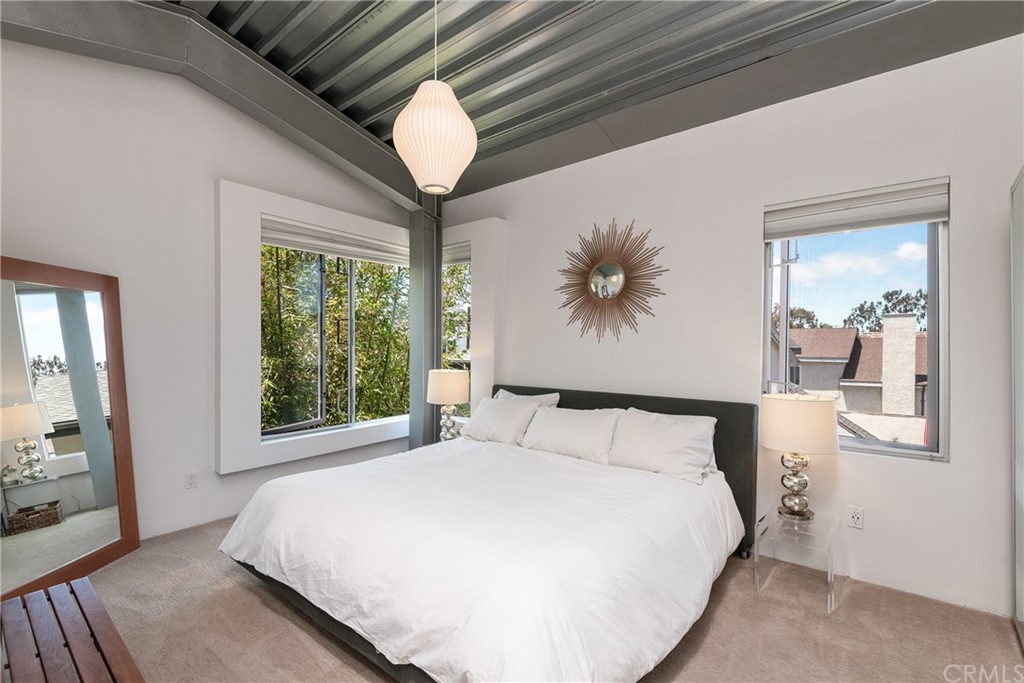 1149 Pine Avenue Manhattan Beach, CA 90266 - Photo 41 of 48 a bedroom with a large bed and a large window