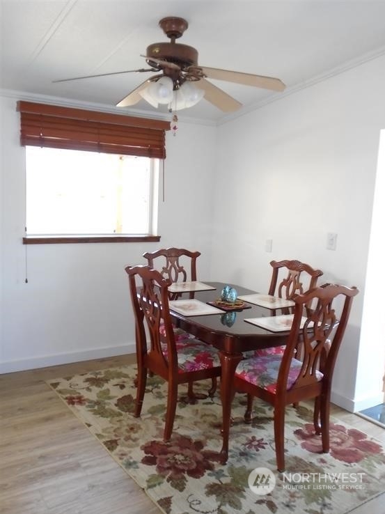 843 Sherburne Road Sequim, WA 98382 - Photo 17 of 40 a view of a dining room with furniture