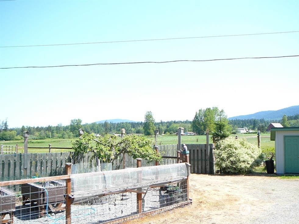 843 Sherburne Road Sequim, WA 98382 - Photo 20 of 40 a view of a balcony with lake view and mountain view