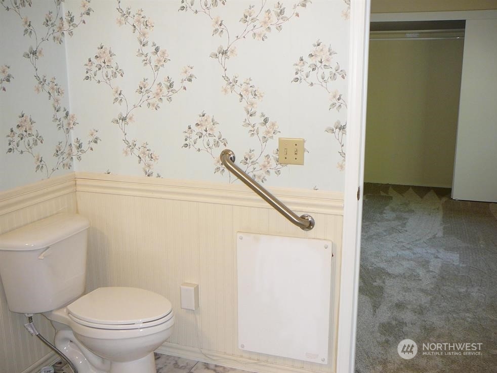 843 Sherburne Road Sequim, WA 98382 - Photo 25 of 40 a bathroom with a toilet and a shower