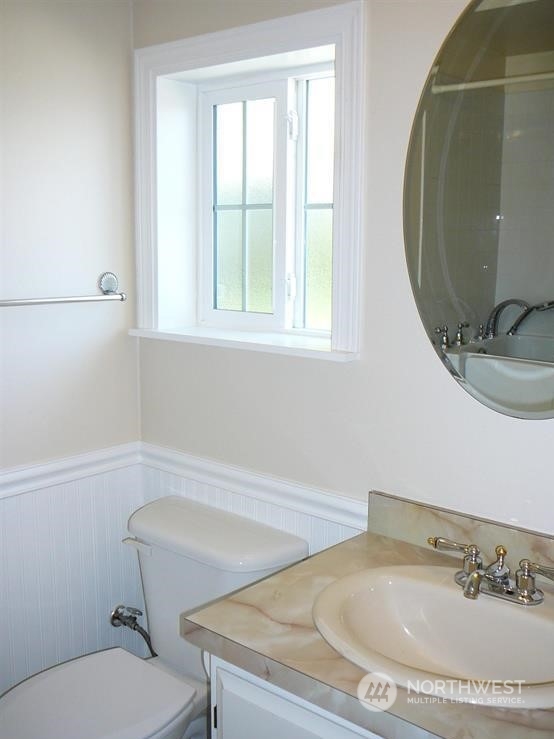 843 Sherburne Road Sequim, WA 98382 - Photo 29 of 40 a bathroom with a sink and a mirror