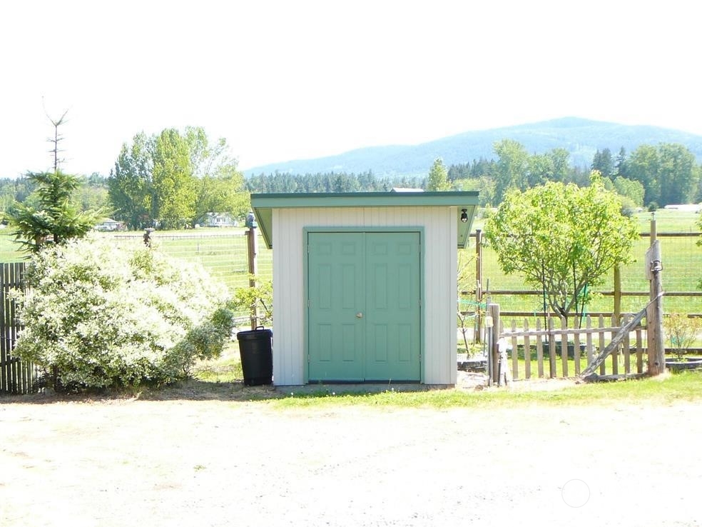 843 Sherburne Road Sequim, WA 98382 - Photo 37 of 40 a front view of a house with a yard