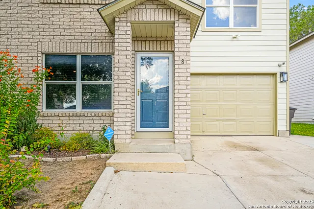 a front view of a house with a outdoor space