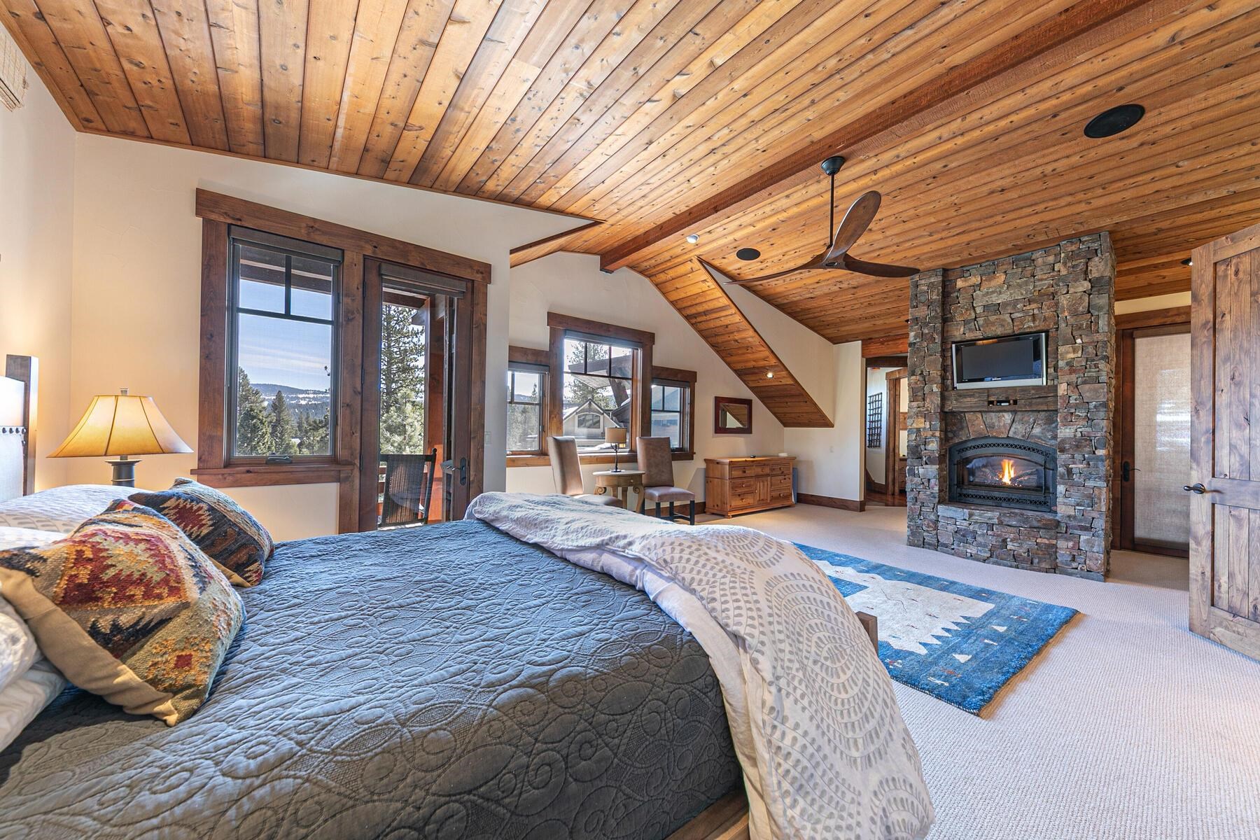 10234 Dick Barter Truckee, CA 96161 - Photo 15 of 28 a bedroom with a large bed and a window