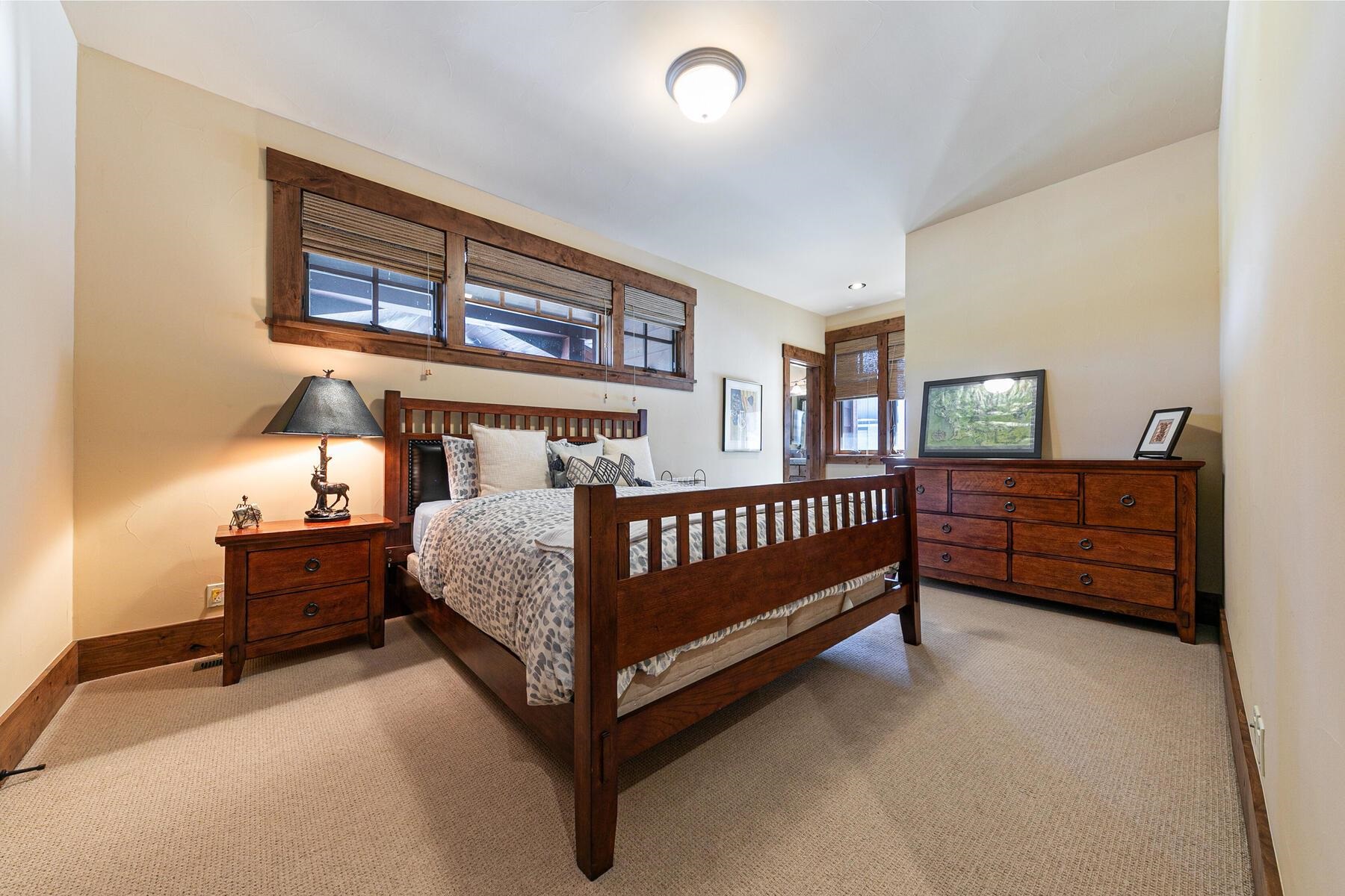 10234 Dick Barter Truckee, CA 96161 - Photo 19 of 28 a bedroom with a bed and window