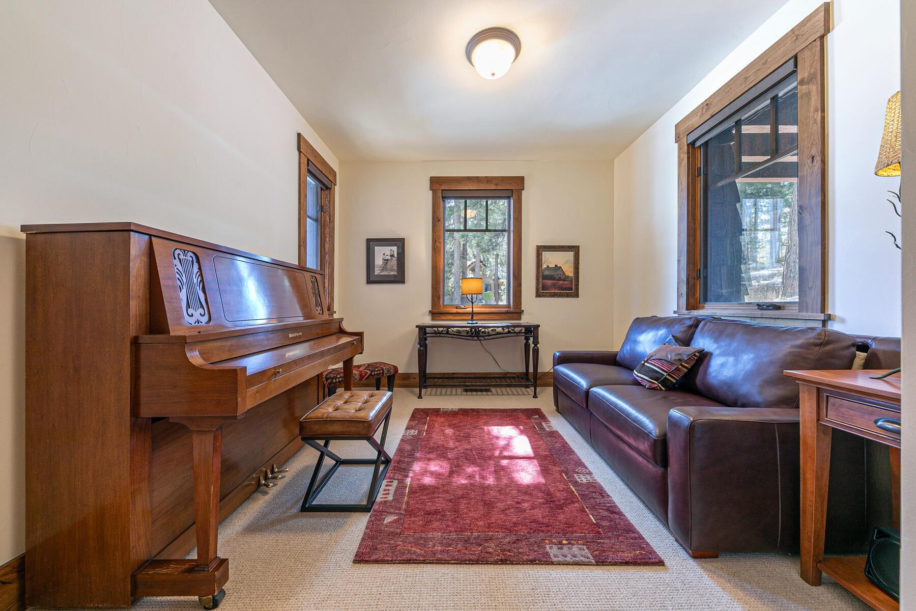 10234 Dick Barter Truckee, CA 96161 - Photo 21 of 28 a living room with furniture and a piano