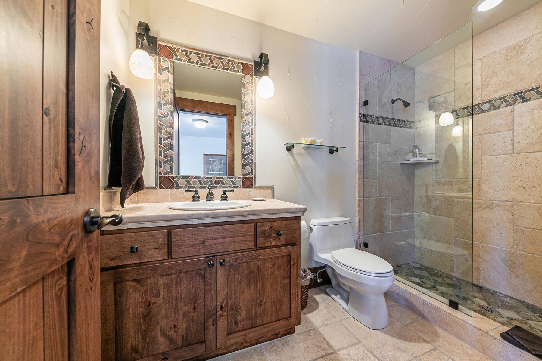 10234 Dick Barter Truckee, CA 96161 - Photo 22 of 28 a bathroom with a double vanity sink mirror and toilet