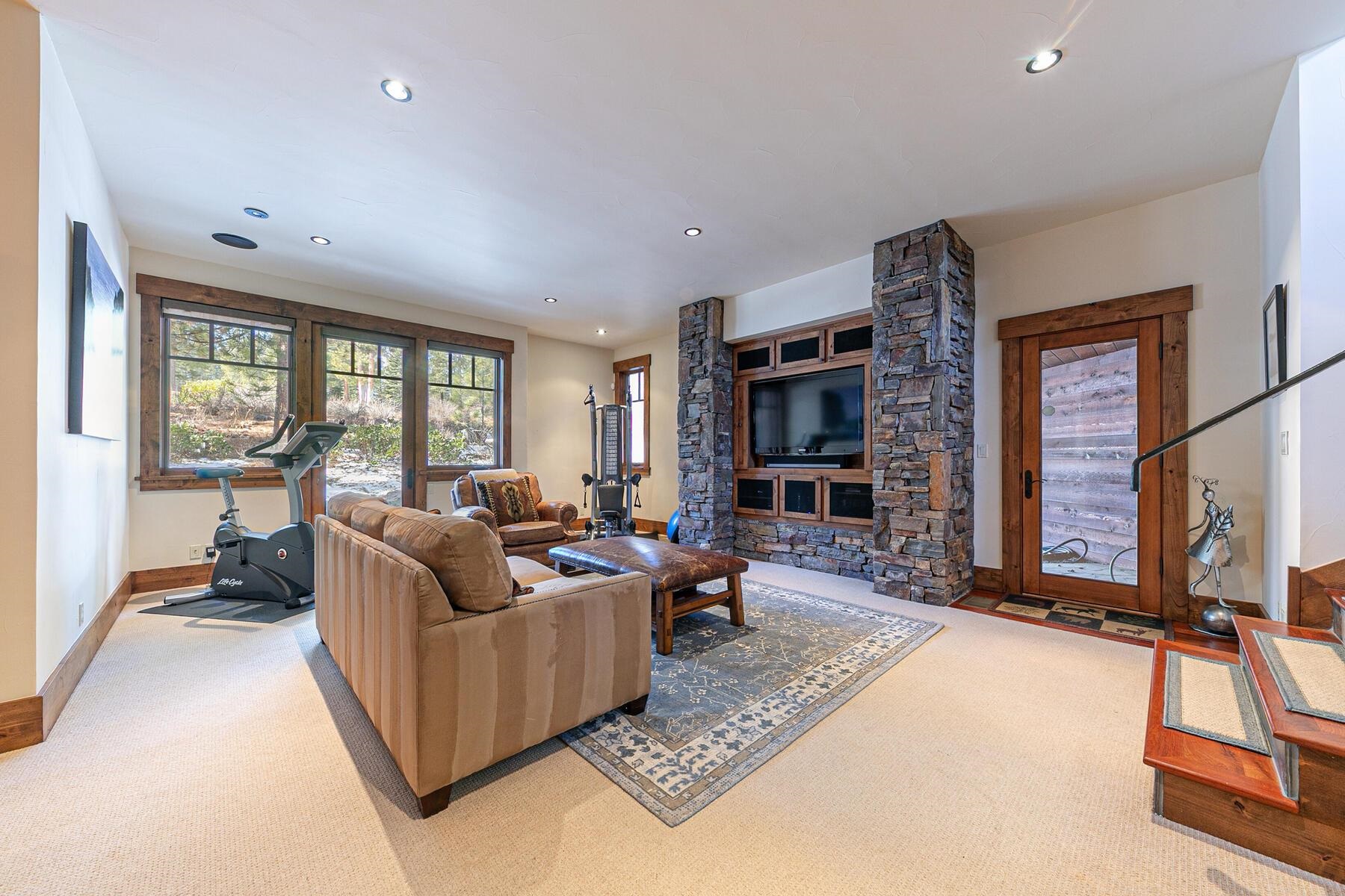 10234 Dick Barter Truckee, CA 96161 - Photo 26 of 28 a living room with furniture window and a flat screen tv