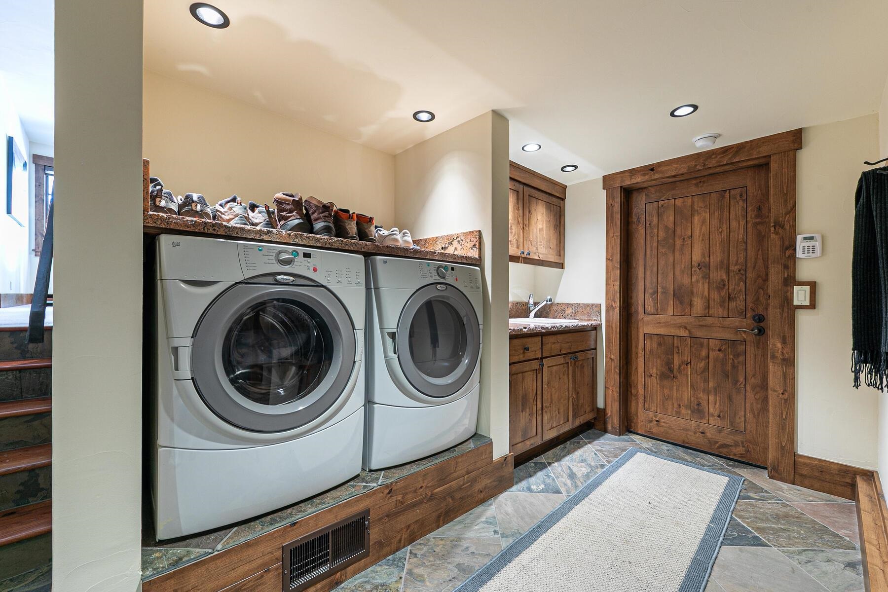 10234 Dick Barter Truckee, CA 96161 - Photo 27 of 28 a utility room with sink dryer and washer