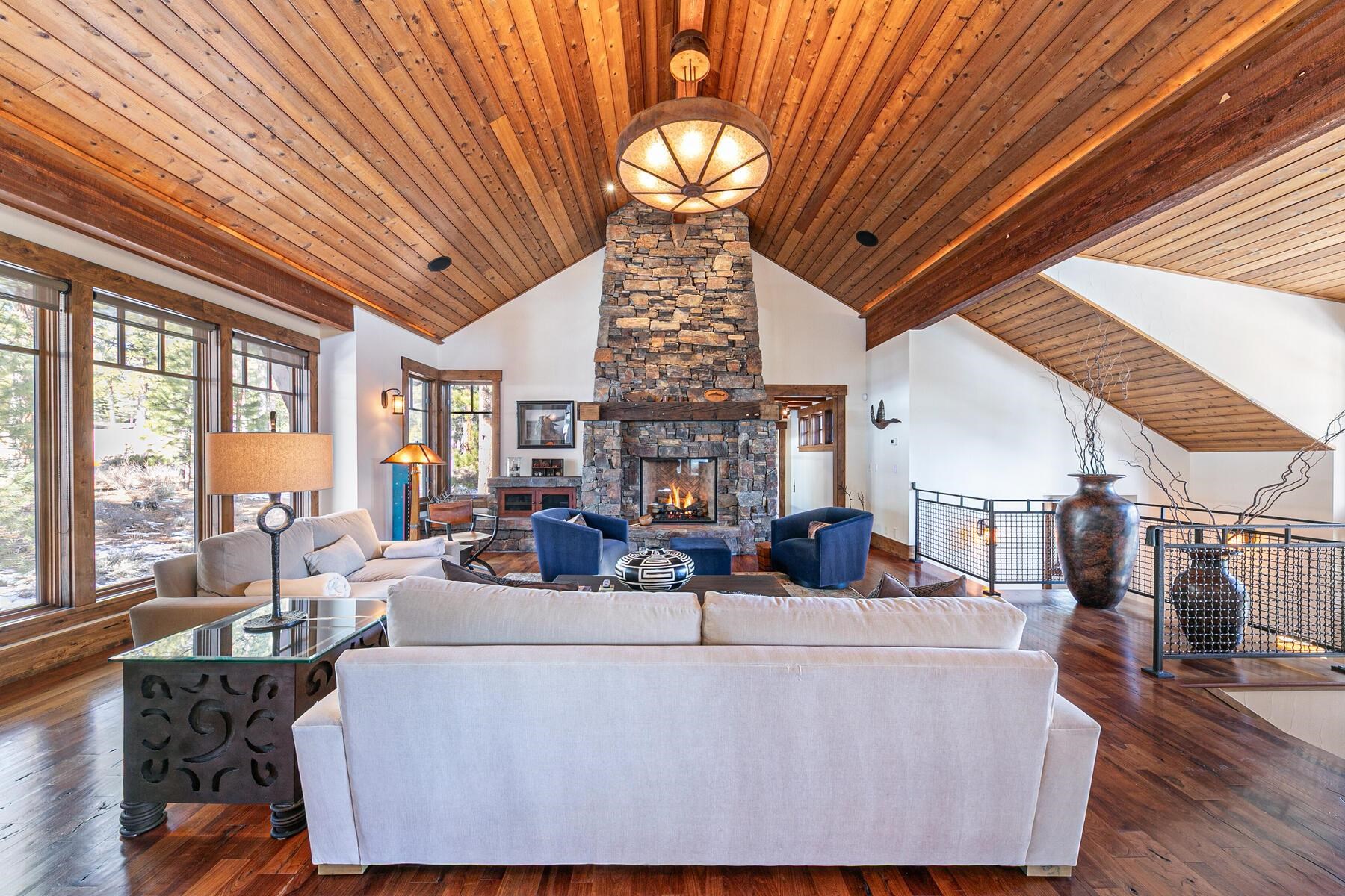 10234 Dick Barter Truckee, CA 96161 - Photo 6 of 28 a living room with furniture a chandelier and a large window