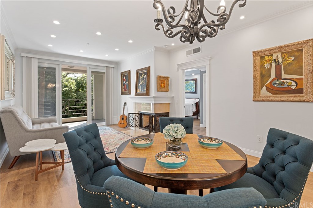 2243 Martin, Unit 314 Irvine, CA 92612 - Photo 13 of 75 a view of a dining room with furniture window and wooden floor