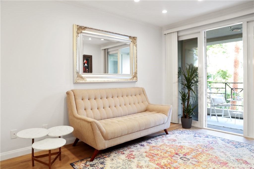 2243 Martin, Unit 314 Irvine, CA 92612 - Photo 20 of 75 a living room with furniture and a large window