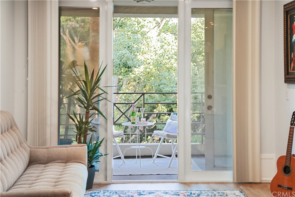 2243 Martin, Unit 314 Irvine, CA 92612 - Photo 21 of 75 a living room with furniture and a window