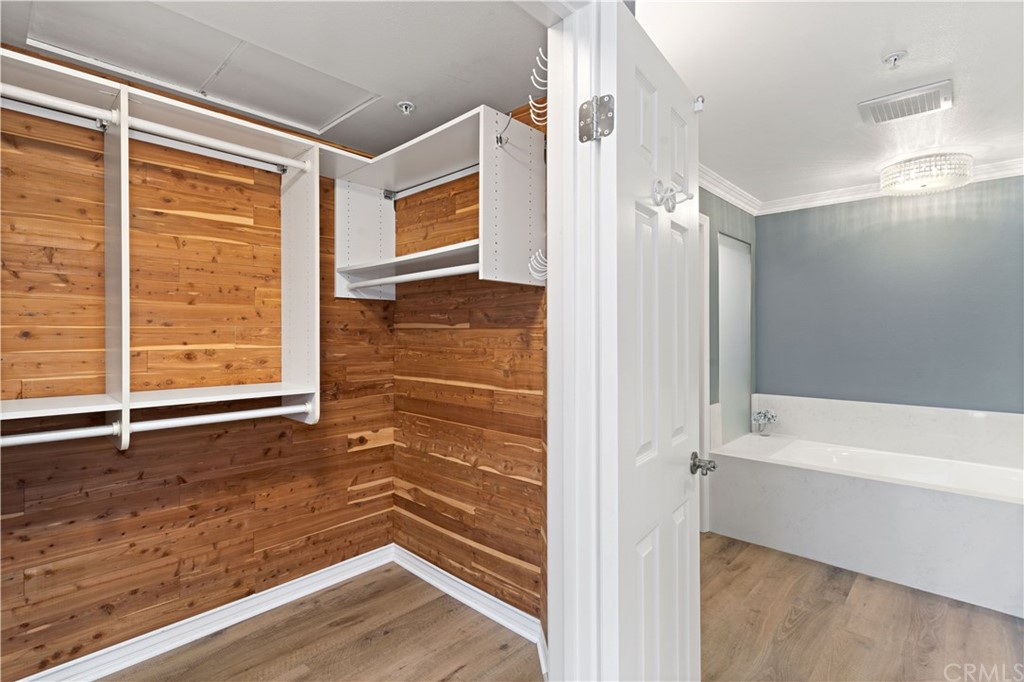 2243 Martin, Unit 314 Irvine, CA 92612 - Photo 36 of 75 a view of an empty room with wooden floor and a window