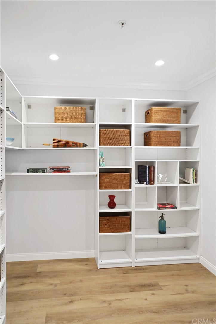 2243 Martin, Unit 314 Irvine, CA 92612 - Photo 49 of 75 a view of walk in closet with empty racks