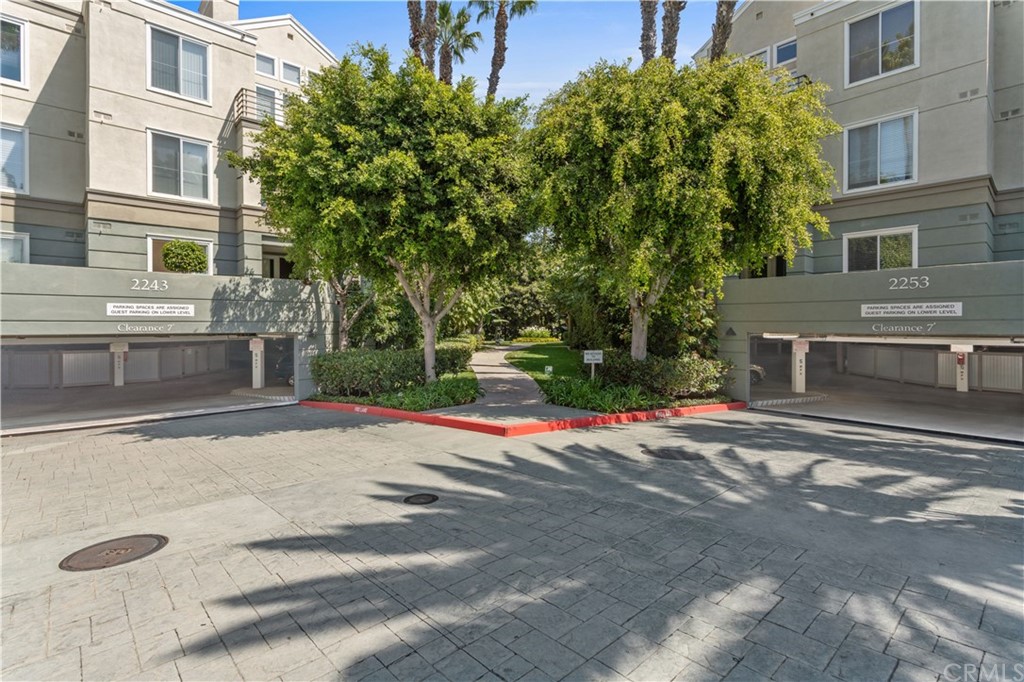 2243 Martin, Unit 314 Irvine, CA 92612 - Photo 73 of 75 a front view of a house with a yard