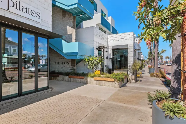a front view of a building with outdoor area