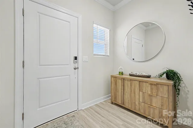 a bathroom with a mirror and a sink