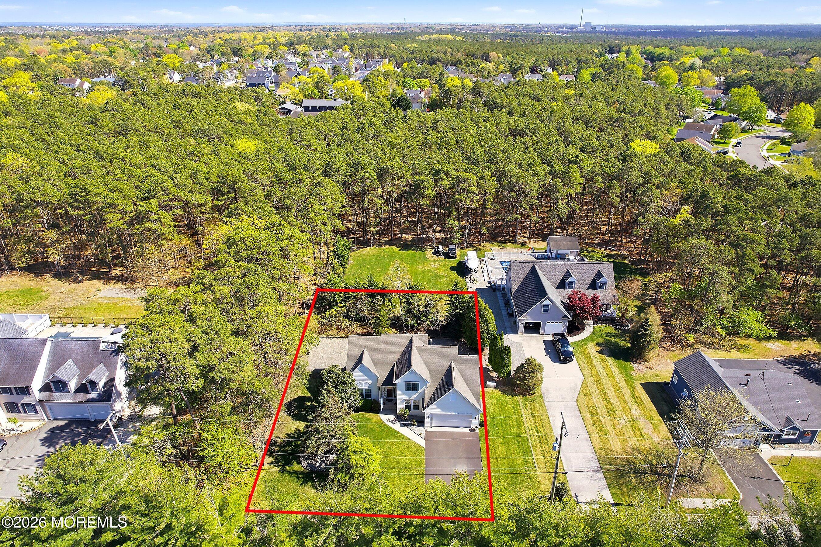 1677 Joffre Road Forked River, NJ 08731 - Photo 27 of 35 an aerial view of residential houses with outdoor space