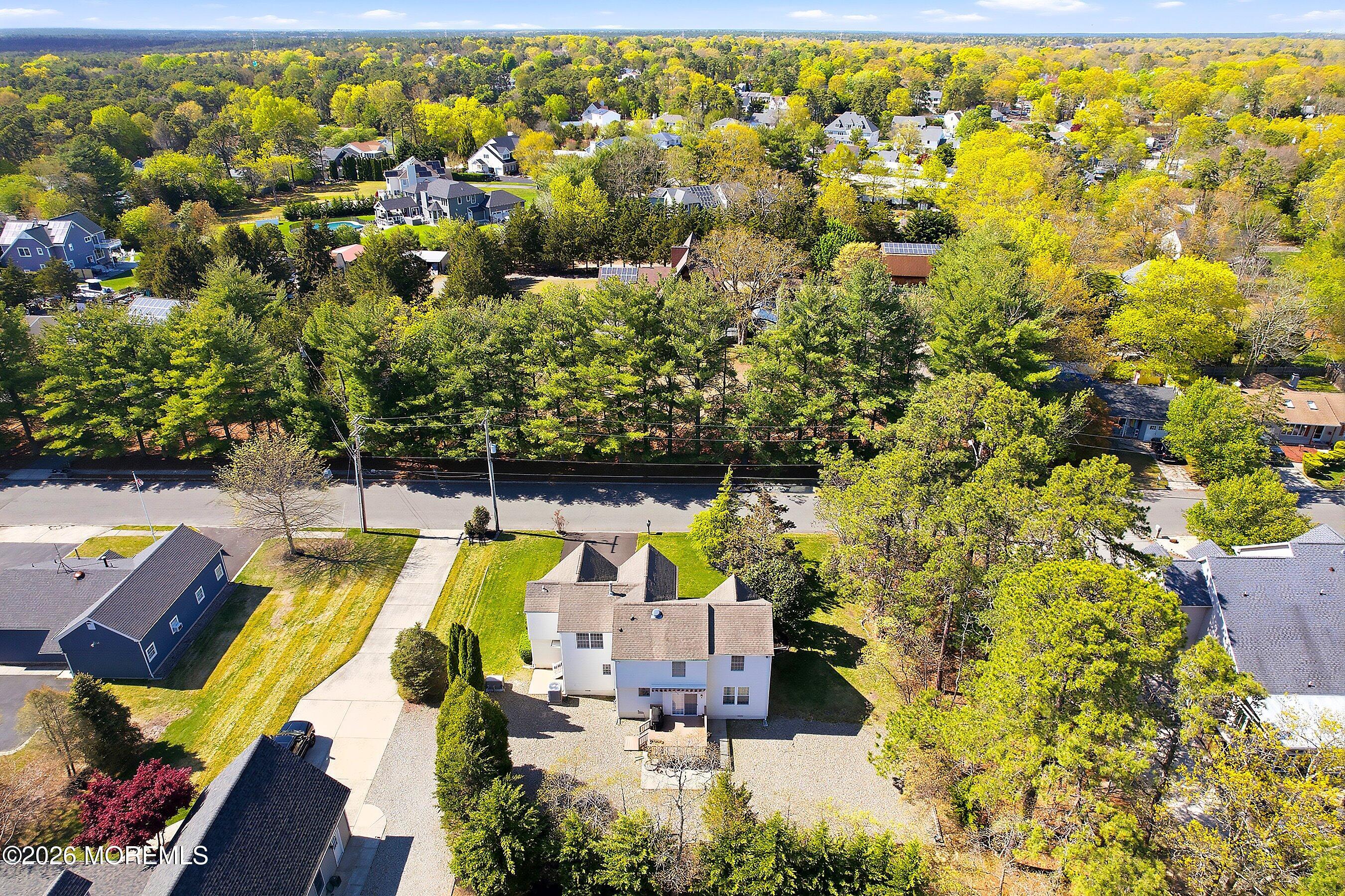 1677 Joffre Road Forked River, NJ 08731 - Photo 29 of 35 an aerial view of residential houses with outdoor space and swimming pool