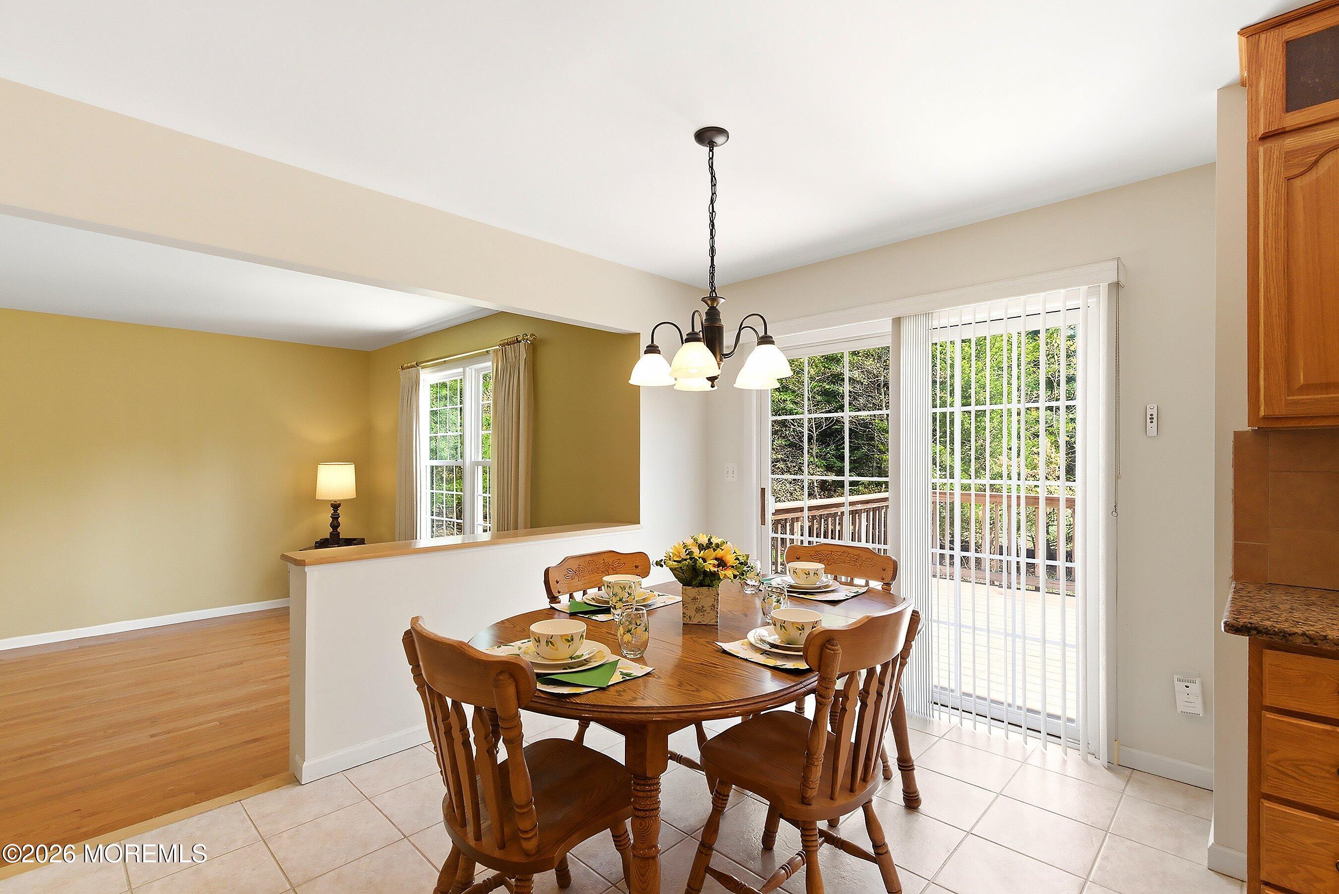 1677 Joffre Road Forked River, NJ 08731 - Photo 9 of 35 a view of a dining room with furniture window and outside view