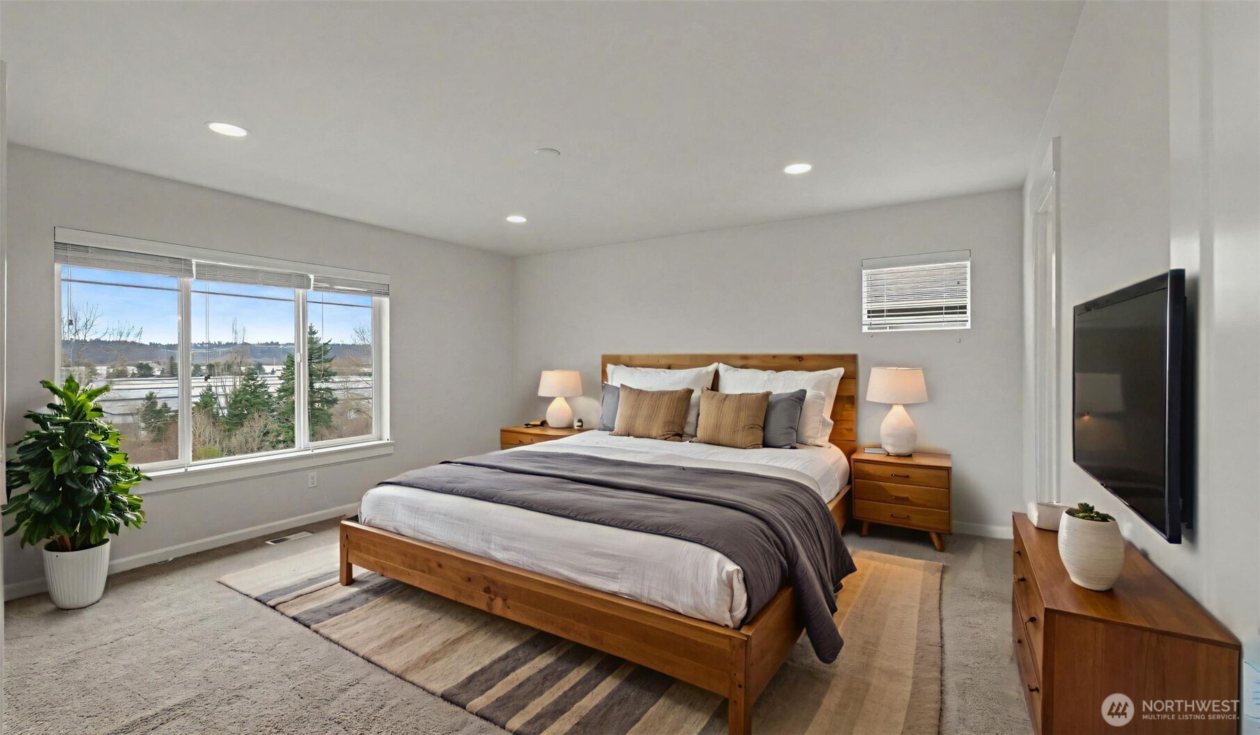 20024 90th Place South Kent, WA 98031 - Photo 17 of 28 a bedroom with bed tv and window