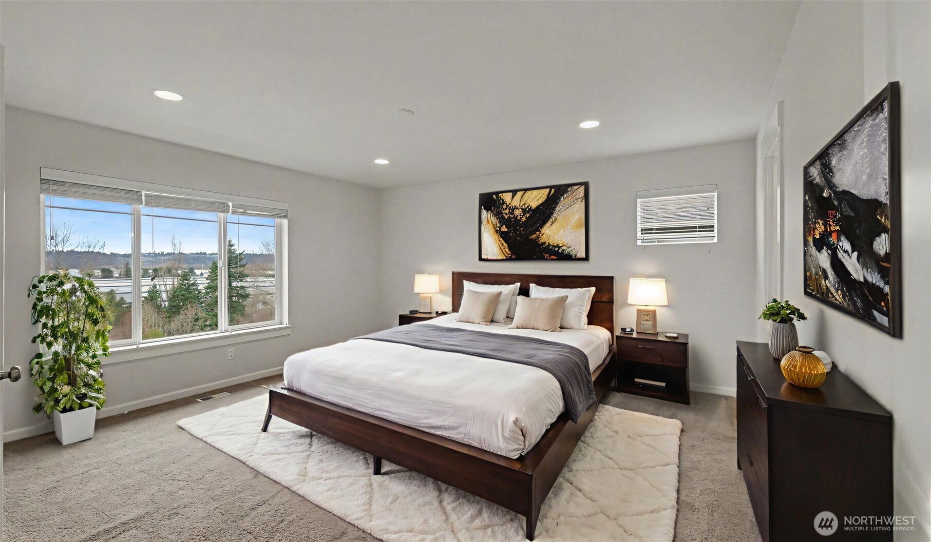 20024 90th Place South Kent, WA 98031 - Photo 19 of 28 a bedroom with a large bed and a window