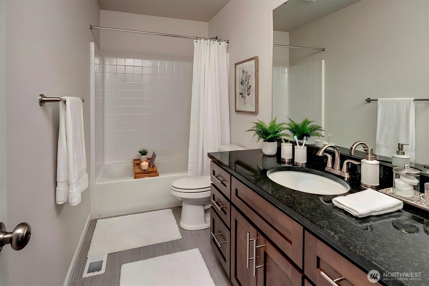 20024 90th Place South Kent, WA 98031 - Photo 23 of 28 a bathroom with a granite countertop sink mirror vanity and toilet