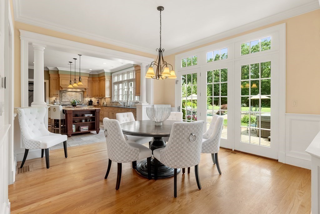 66 Goodnow Road Sudbury, MA 01776 - Photo 13 of 42 a view of a dining room with furniture window and wooden floor