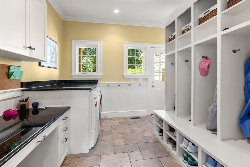 66 Goodnow Road Sudbury, MA 01776 - Photo 17 of 42 a kitchen with a sink and cabinets