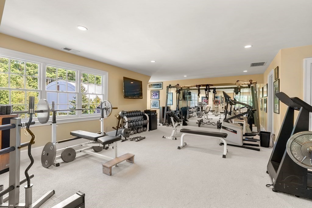 66 Goodnow Road Sudbury, MA 01776 - Photo 24 of 42 a view of a room with gym equipment