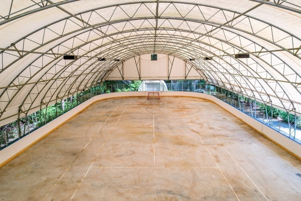 66 Goodnow Road Sudbury, MA 01776 - Photo 30 of 42 a view of an entrance gate of a building