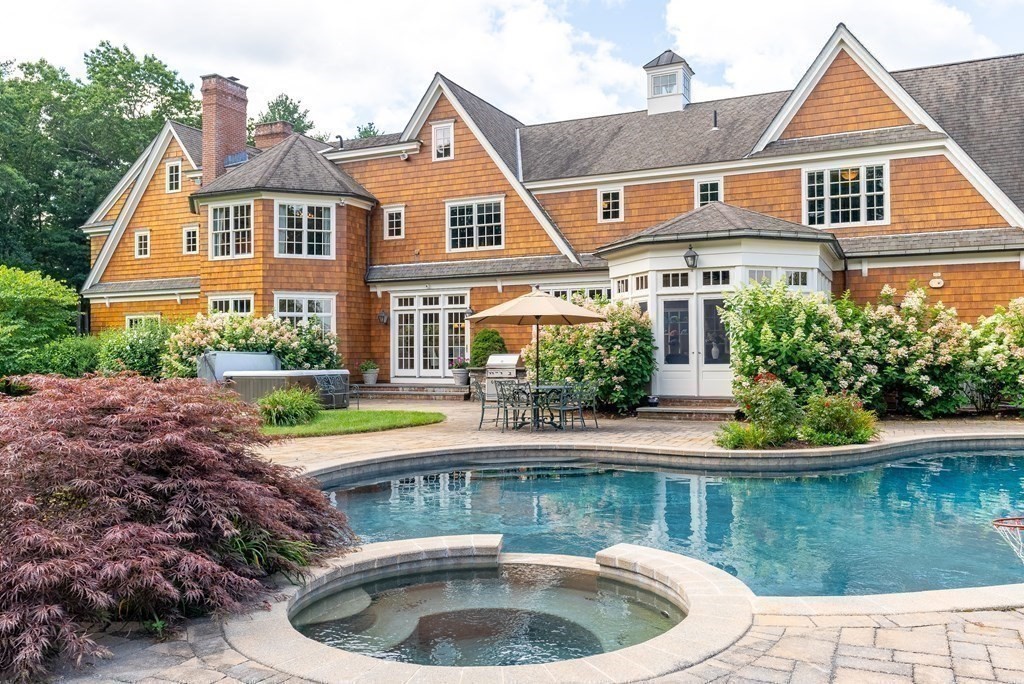 66 Goodnow Road Sudbury, MA 01776 - Photo 32 of 42 a house with river in front of it