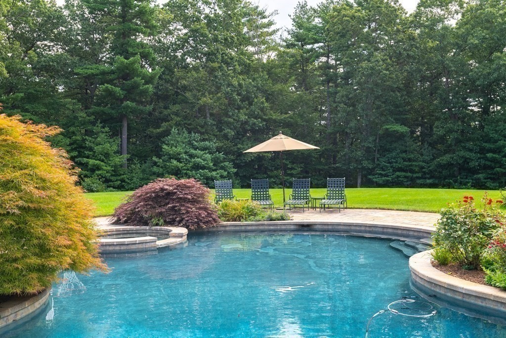 66 Goodnow Road Sudbury, MA 01776 - Photo 34 of 42 a view of a swimming pool and lounge chair