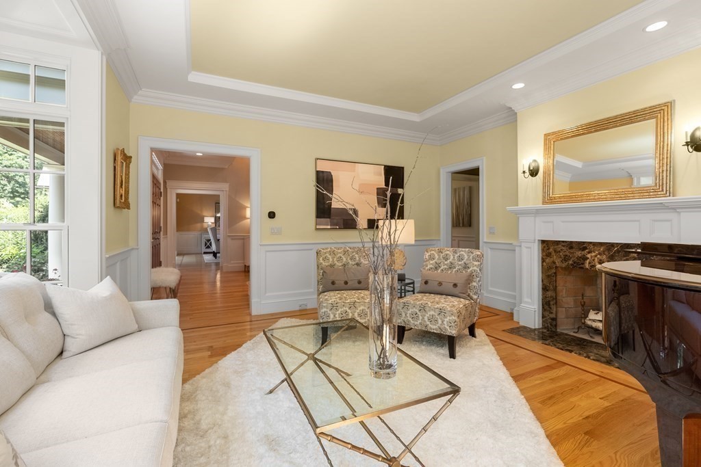 66 Goodnow Road Sudbury, MA 01776 - Photo 7 of 42 a living room with furniture and a fireplace