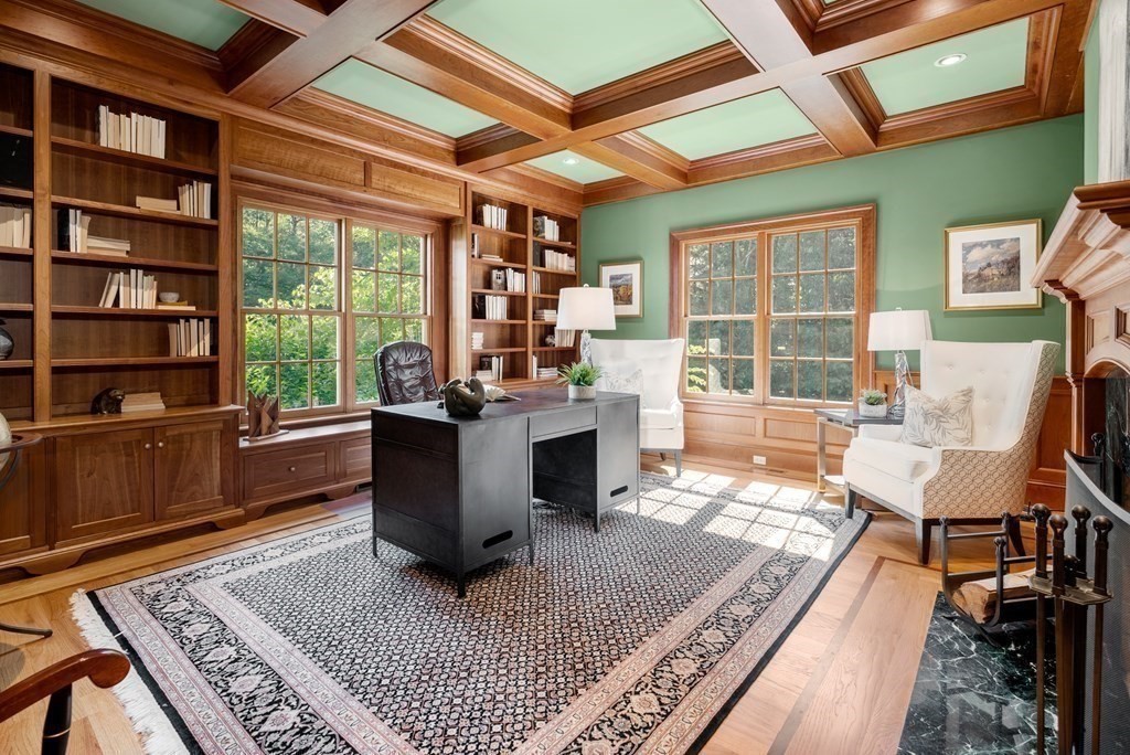 66 Goodnow Road Sudbury, MA 01776 - Photo 8 of 42 a living room with furniture and a fireplace