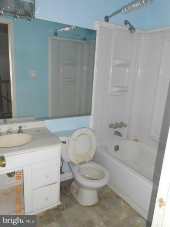 4807 Variation Road Baltimore, MD 21236 - Photo 13 of 13 a bathroom with a sink toilet and shower