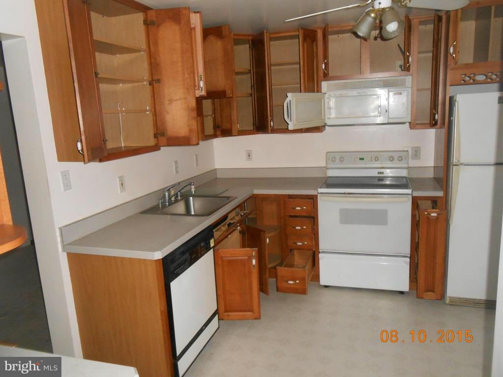 4807 Variation Road Baltimore, MD 21236 - Photo 2 of 13 a utility room with washer and dryer
