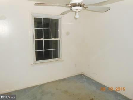 4807 Variation Road Baltimore, MD 21236 - Photo 5 of 13 an empty room with a window