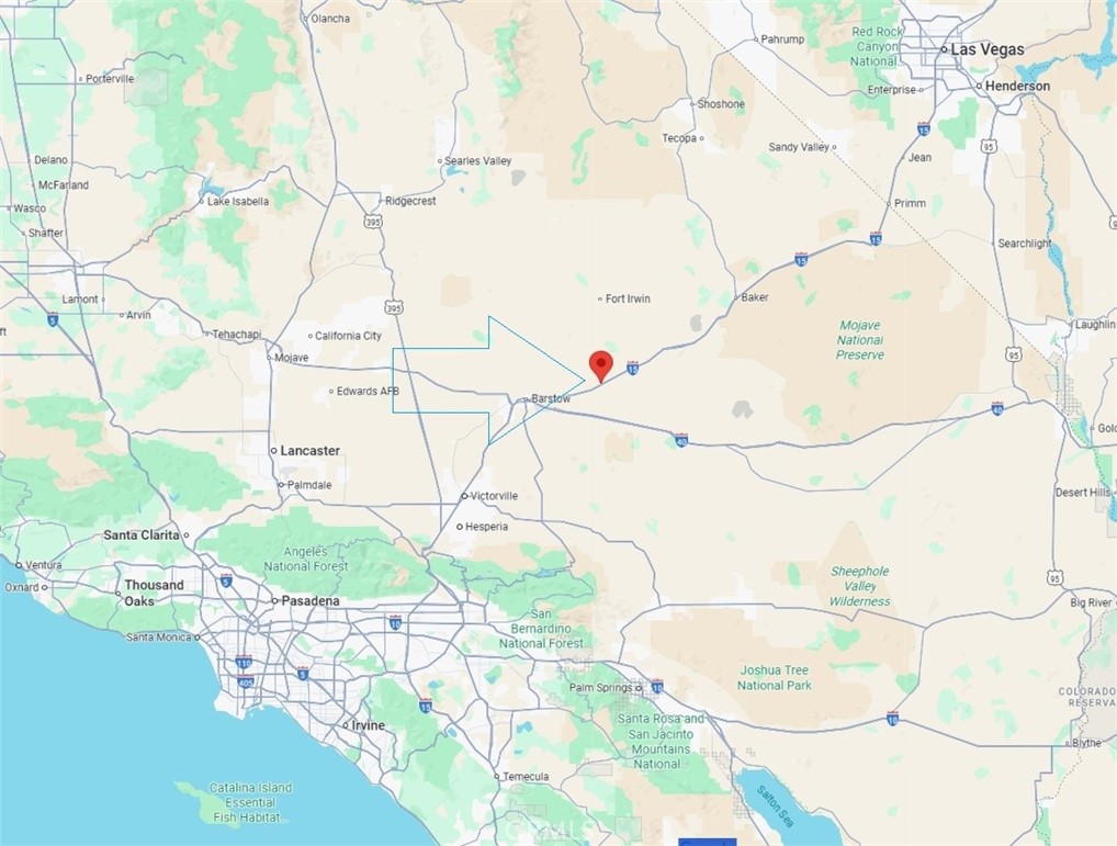 38870 Mountain View Road Newberry Springs, CA 92365 - Photo 19 of 19 a close up of a white vase with a white door