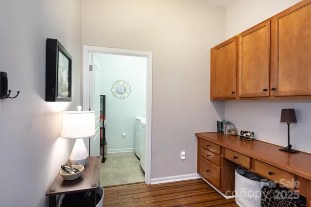 a room with cabinets and wooden floor