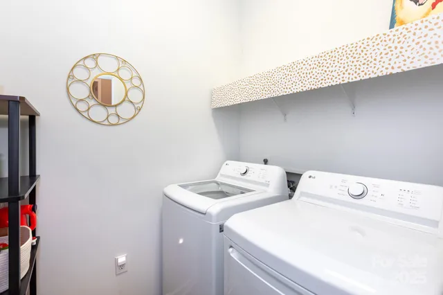 a utility room with dryer and washer