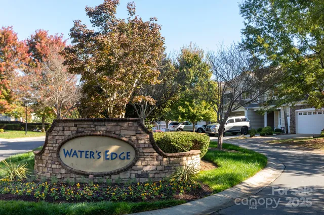 a view of swimming pool yard and outdoor seating
